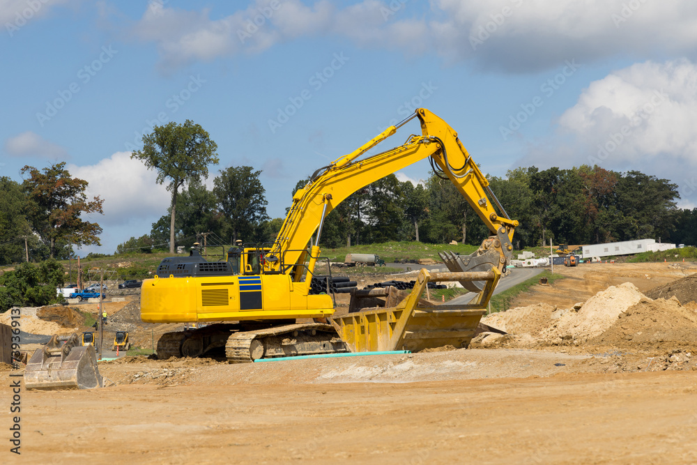 excavator working on a construction site excavator working on a construction site