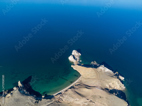 Sarayskiy beach. Shamanka Rock. Lake Baikal at Olkhon Island. the village of Khuzhir photo