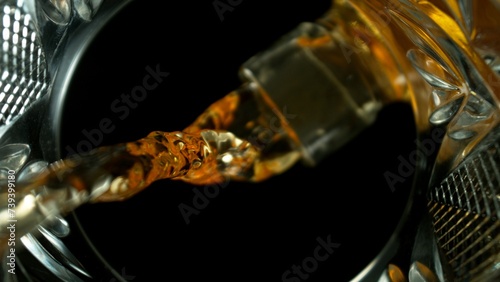 Freeze Motion Shot of Whiskey Liquid Pouring, Macro, Unique Angle of View from the Bottom of the Glass