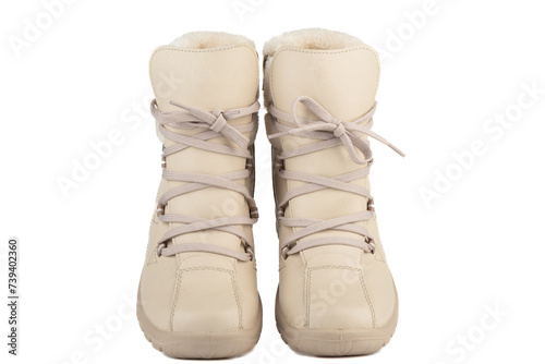 Women's winter high boots with leather upper and fur inside.