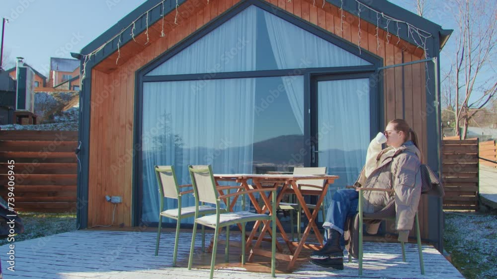 Terrace of woman's private property woman enjoys coffee Surrounded by beauty of private property appreciates peaceful morning. Private property comfort with nature perfect backdrop for relaxation. Terrace of woman's private property woman enjoys coffee Surrounded by beauty of private property appreciates peaceful morning. Private property comfort with nature perfect backdrop for relaxation.