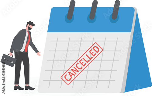Business trip canceled, marketing event, plan to launch new product postpone or canceled due to COVID-19 Coronavirus pandemic concept, sad businessman standing with calendar with red Canceled stamp

