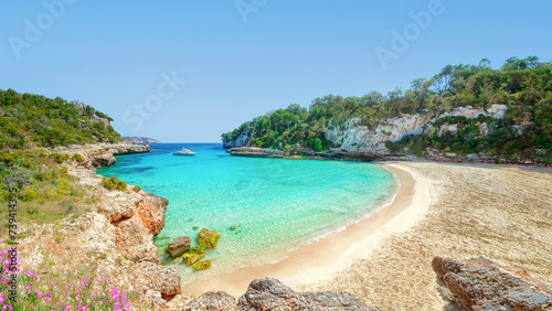 A view of the beach at Cala Llombards, Mallorca, Spain. photo