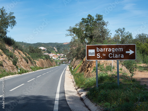 Santa Clara dam, Algarve, Portugal. Road sign.