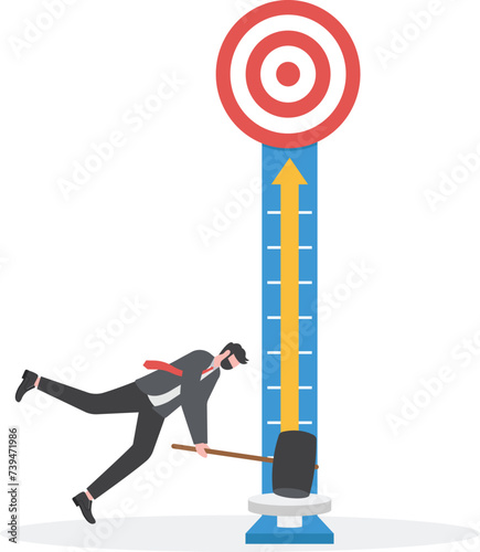 Businessman hitting a success tester machine with a hammer to target

