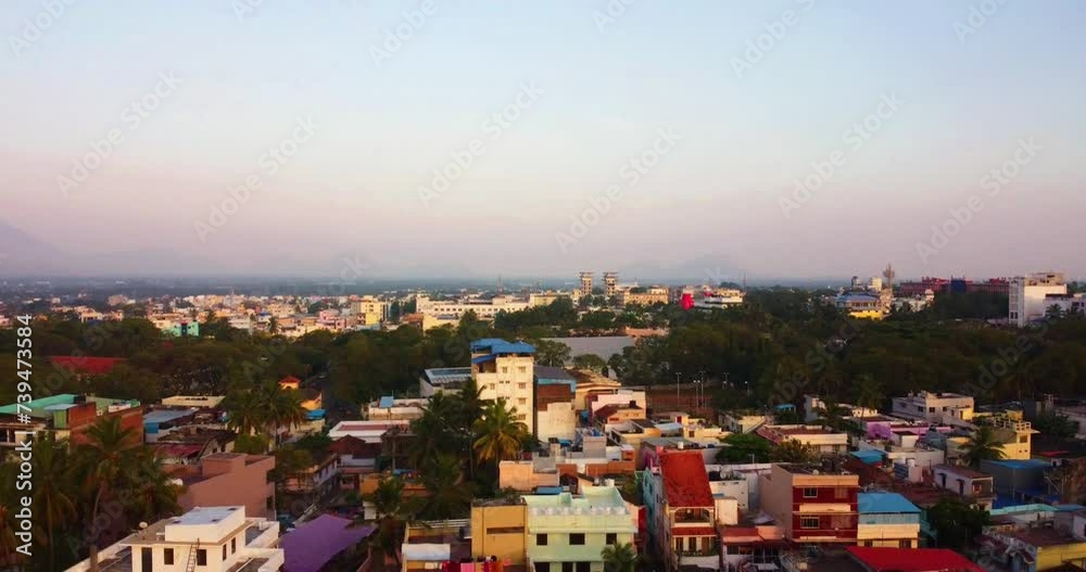 Ascending drone over Nagercoil town, Kanyakumari District showing trees and buildings Ascending drone over Nagercoil town, Kanyakumari District showing trees and buildings