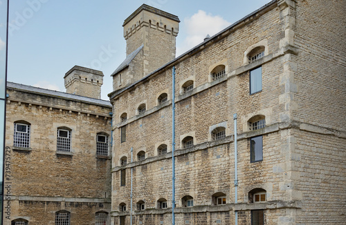 Oxford Castle and Prison. Oxford Castle is a large, partly ruined medieval castle on the western side of central Oxford photo