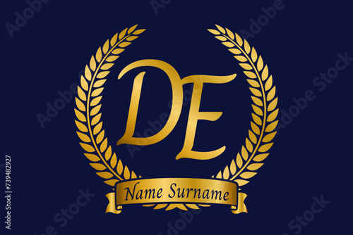 Initial letter D and E, DE monogram logo design with laurel wreath. Luxury golden calligraphy font.