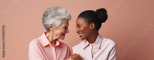 Senior old woman with young pretty woman with arms around each other in support of International Women's Day. March 8. Sisterhood and females friendship. Happy Mother's day