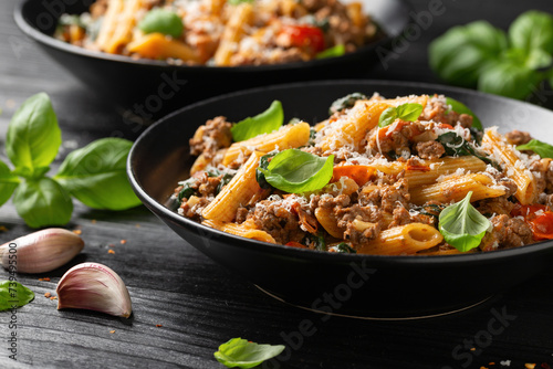 Creamy Tuscan pasta with minced beef, sun dried tomatoes, spinach and parmesan cheese