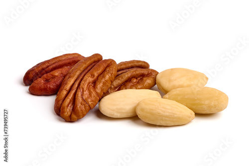 Pecan and blanched almonds, isolated on white background. photo