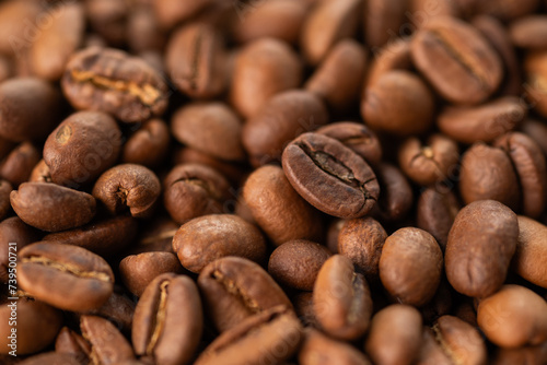 Brown roasted coffee beans, close up 