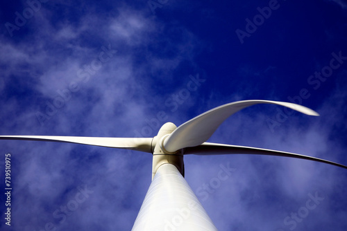 A windturbine and a blue sky photo