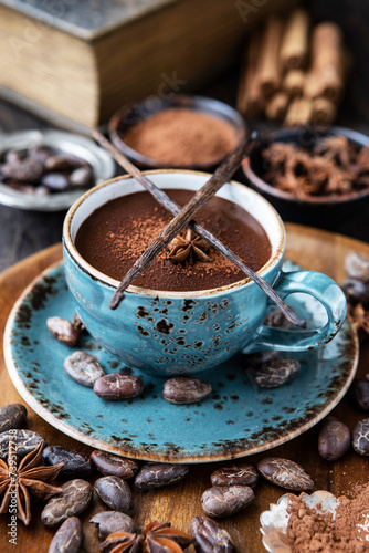 Cocoa drink in  ceramic mug  on   dark  background