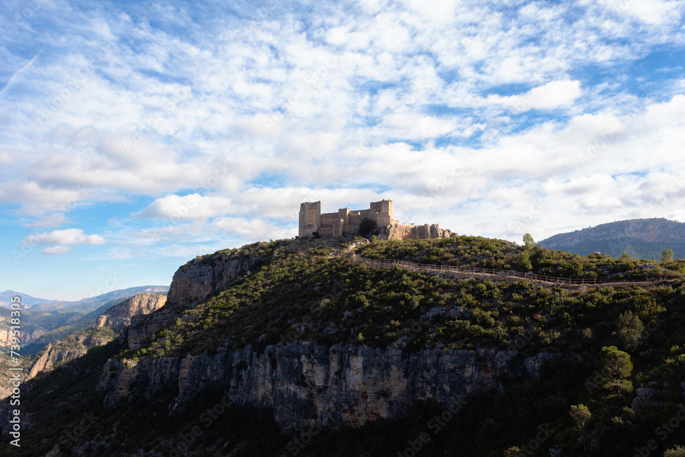 View of the castle of Chirel located on top of a hill on a sunny day. Cortes de Pallas - Valencia - Spain