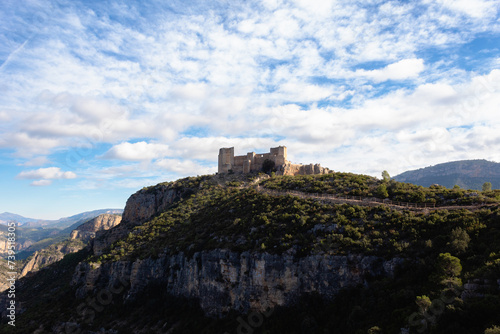 View of the castle of Chirel located on top of a hill on a sunny day. Cortes de Pallas - Valencia - Spain