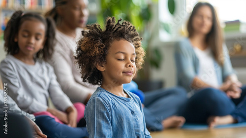 Parents and children attending a workshop on mindfulness and emotional intelligence, learning techniques for managing stress and fostering resilience, love, respect, tolerance, edu