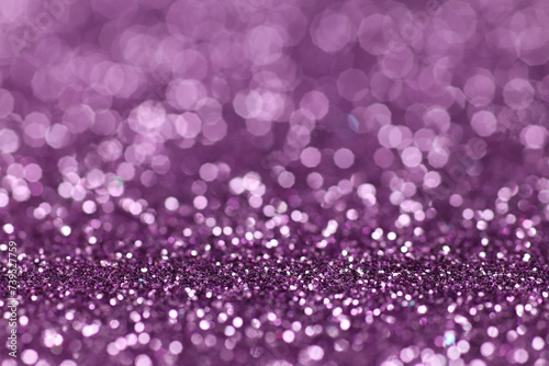 Abstract shiny lilac background made of glitter.
