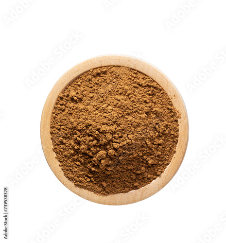 cinnamon powder in a wooden bowl isolated on a white background, top view.