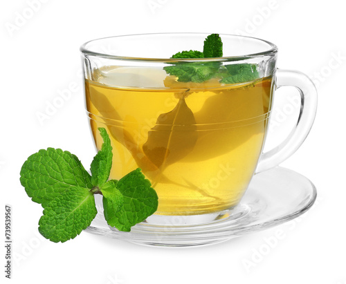 Fresh green tea in glass cup, mint and saucer isolated on white