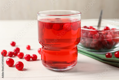 Wallpaper Mural Tasty cranberry juice in glass and fresh berries on white wooden table, closeup Torontodigital.ca