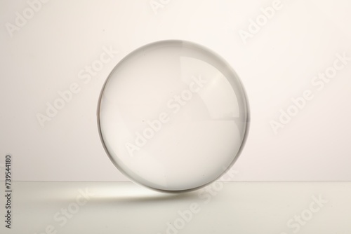View of transparent glass ball on white background