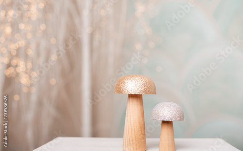 Decorative mushrooms with sparkling lights in background.