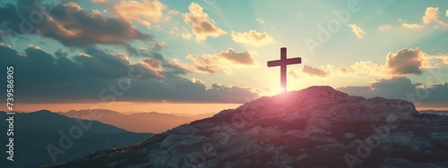 Majestic cross stands atop mountain, illuminated by golden sunrise, conveying hope and spiritual inspiration, Good Friday and Easter Sunday concept photo