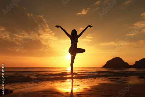 Woman doing acrobatics on a beach