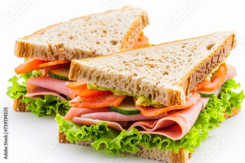 Ham and vegetable sandwiches on white background