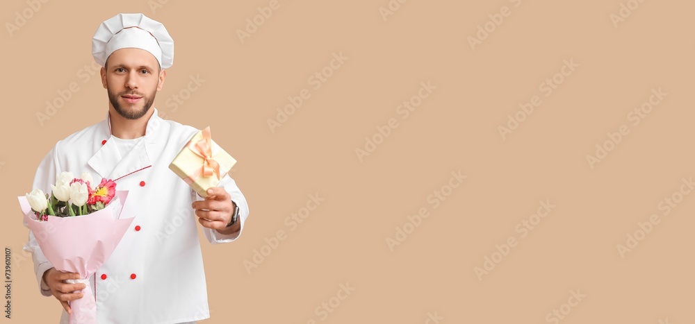Young male doctor with flowers and gift on beige background with space for text. International Women's Day
