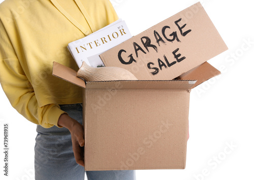Woman holding box of unwant...