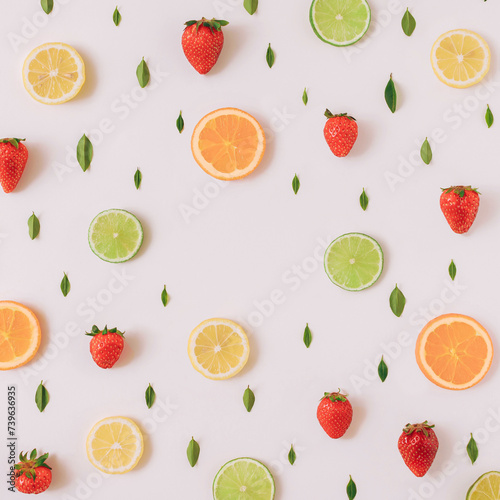Colorful pattern made of citrus fruits  leaves and strawberries