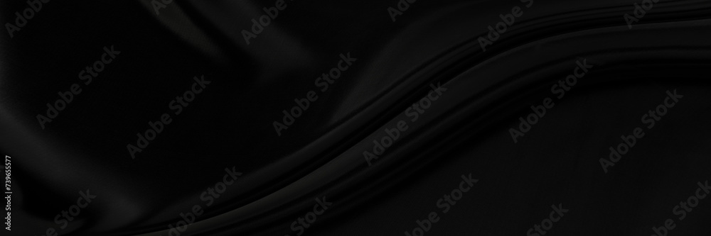 Black gray satin dark fabric texture luxurious shiny that is abstract silk cloth background with patterns soft waves blur beautiful.