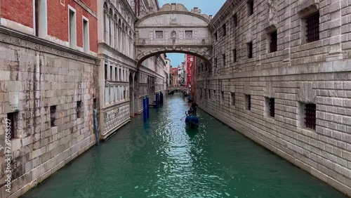 Medieval houses, narrow canals, gondolas in Venice, Italy, February 10, 2024. High quality 4k footage photo