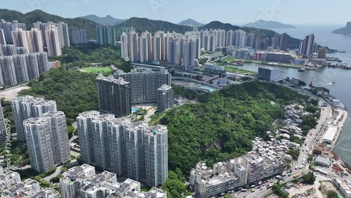 Hong Kong, Kowloon Bay, Ngau Tau Kok, Kwun Tong, Lam Tin, Cha Kwo Ling, Yau Tong Business District, adjacent to Victoria Harbor, enjoying the view of Victoria Harbor. Hong Kong's industrial center photo