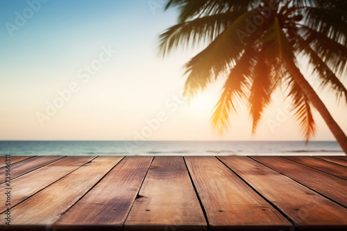 Top of wood table with seascape and palm tree  blur bokeh light of calm sea and sky at tropical beach background. summer vacation background concept.