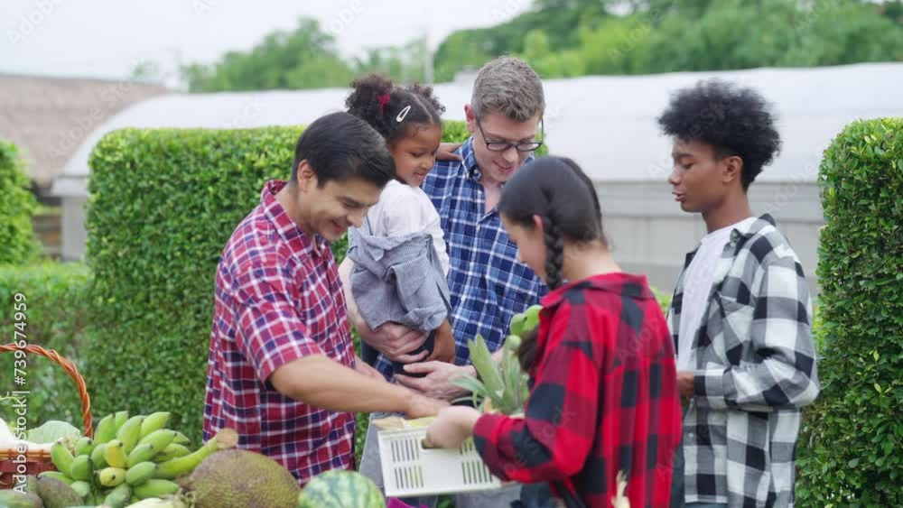 4K Healthy food for sustainable living and small business concept. Group of Happy people enjoy life healthy eating choosing and buying organic tropical fruit at farmers market in the morning.