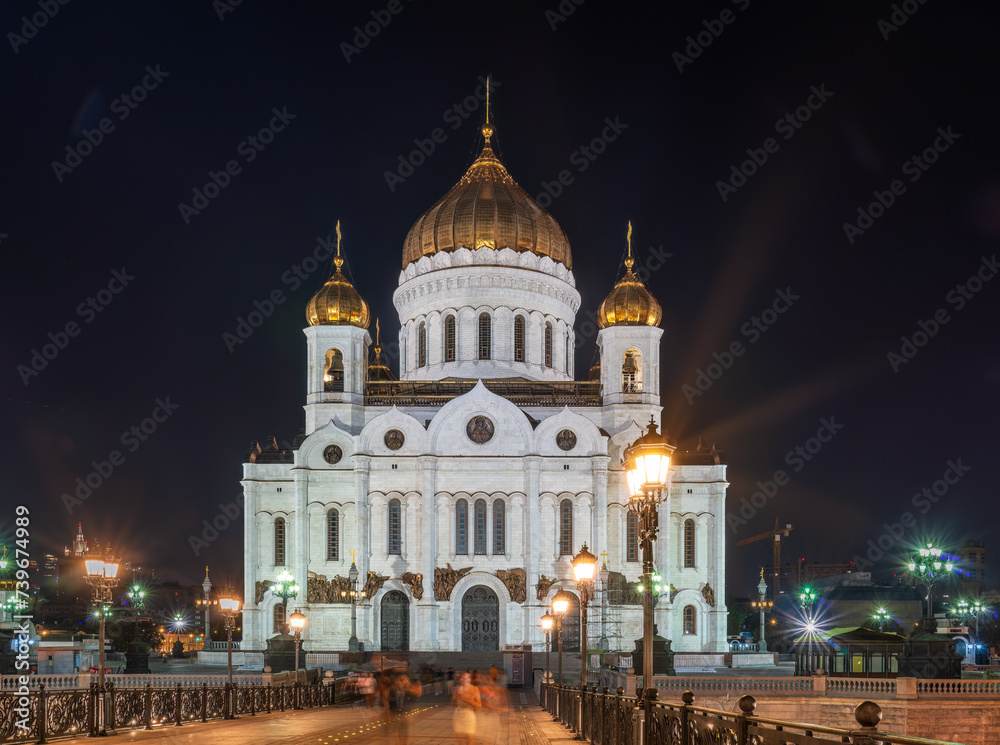 Cathedral of Christ the Savior and Patriarshy bridge at night in Moscow, Russia