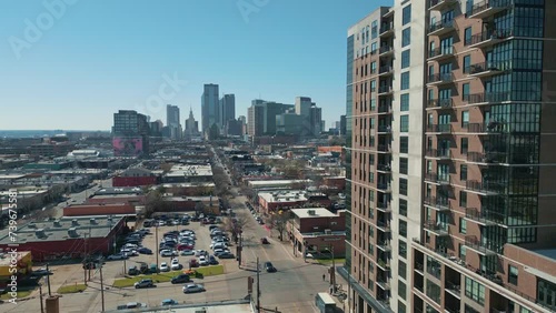 Panning Reveal Shot of Dallas Texas Skyline and Deep Ellum Entertainment District photo