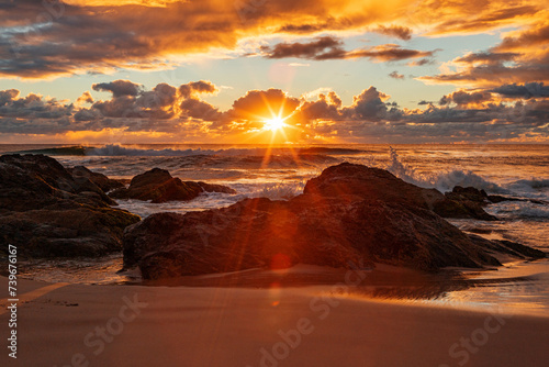 The view of the sunrise from the sea level from the Broadbeach in Gold Coast © Gavin