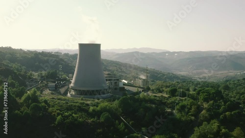 Enel Geothermal Green Renewable Sustainable Power Plant Cooling Towers Landscape in Larderello, Tuscany, Italy, drone aerial view photo
