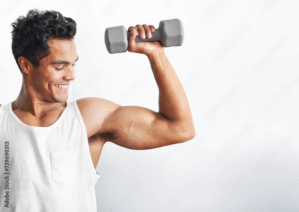 Fitness, gym and happy man with dumbbell in studio for weightlifting, sports or mockup on white background. Training, face or male bodybuilder with space for power, performance or bicep challenge