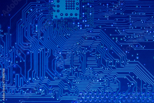 blue printed motherboard. computer electronic circuit board. closeup view.
