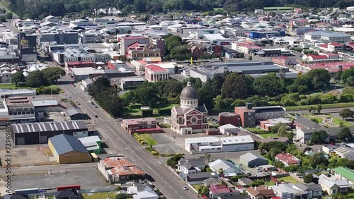 Church building, city park and historic landmarks on main street. Invercargill, New Zealand. Aerial drone photo
