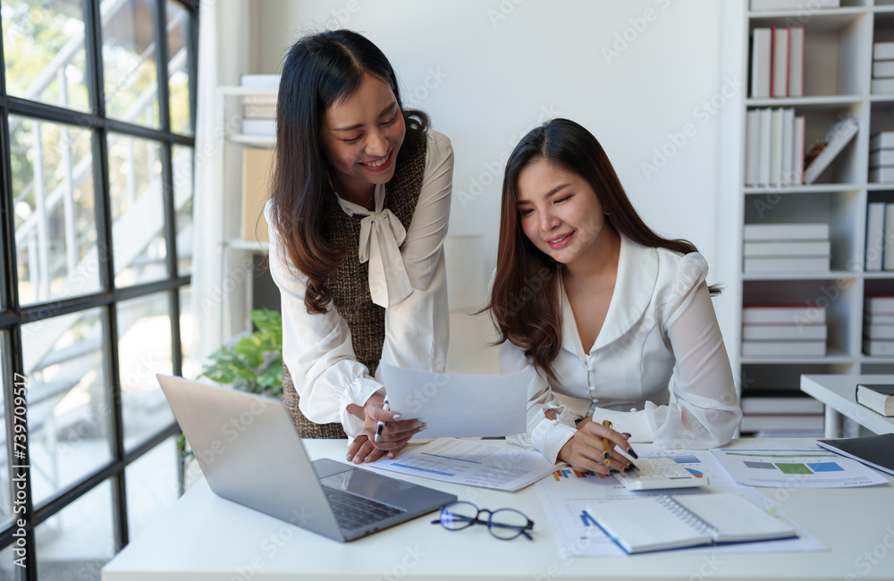 Analysis, Discussion, Asian women economists and marketers use a tablet computers to plan investments and finances to prevent risks and losses for the company, Negotiation
