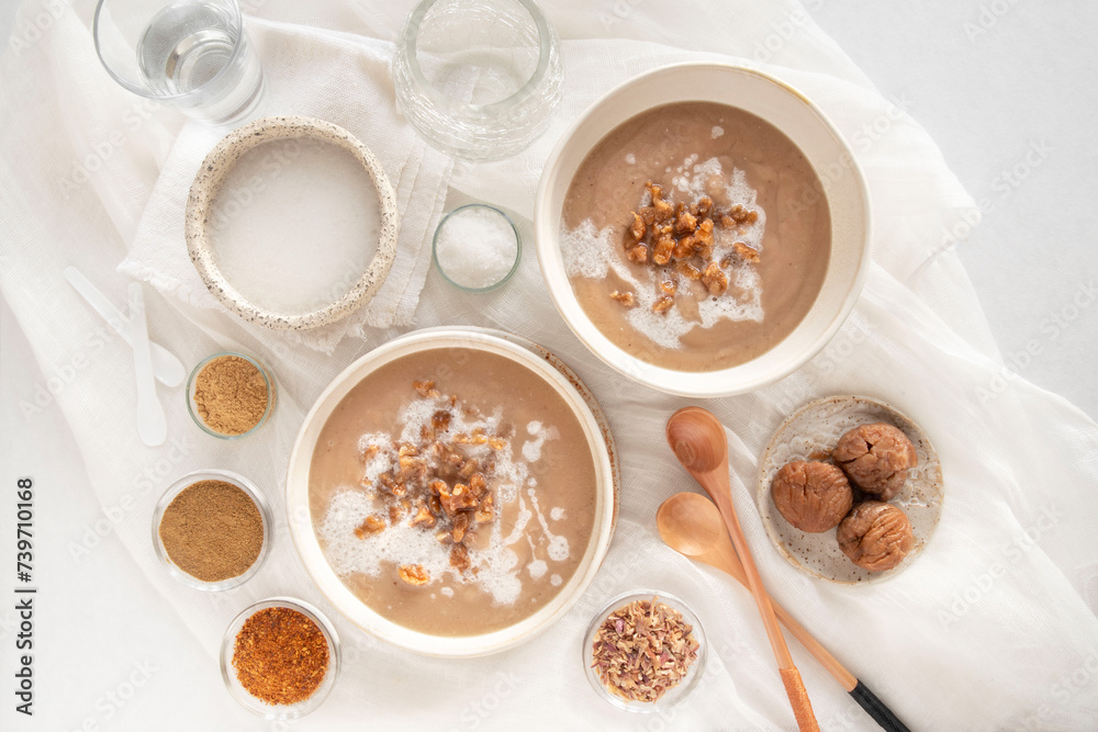 Chestnut soup with spices in bowls Chestnut soup with spices in bowls