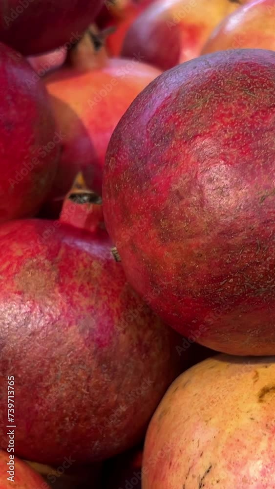 supermarket or market in Vietnam many pomegranate and one cut in half,pomegranate background,Fall pomegranate harvest,hd footage pomegranate fruit full screen supermarket or market in Vietnam many pomegranate and one cut in half,pomegranate background,Fall pomegranate harvest,hd footage pomegranate fruit full screen