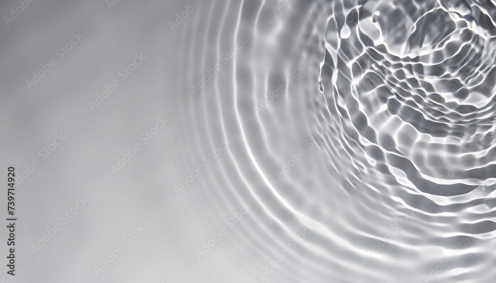 Water drop Ripple Flow sunlight top view Background, Circle wave pattern water well free space display product, Transparent clear water surface texture with ripples, splashes, Water Grey Background Water drop Ripple Flow sunlight top view Background, Circle wave pattern water well free space display product, Transparent clear water surface texture with ripples, splashes, Water Grey Background