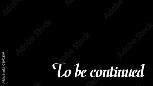 To be continued.物語は続く黒い画面。カリグラフィーブラシで手書きした文字。